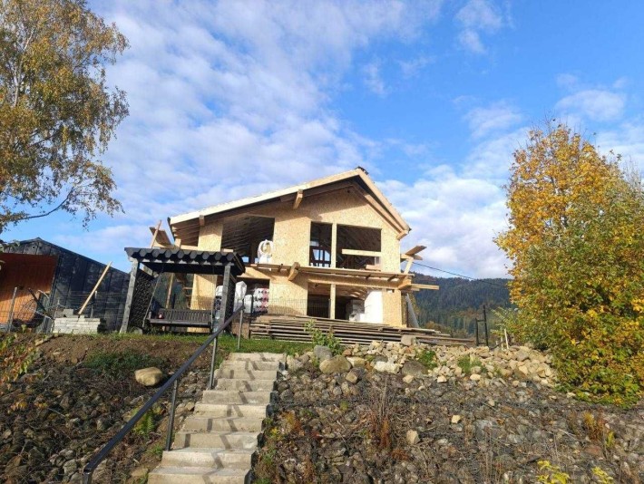 Будинок з брусу, дерев'яний будинок - фото 1