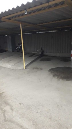 место на крытой стоянке - фото 1