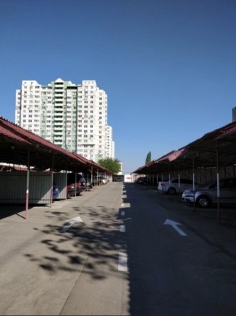Продам парковочное место на стоянке Бочаров 60 - фото 1