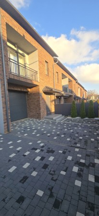 Перша оренда.  Таунхаус з гаражем в топовому районі - фото 1