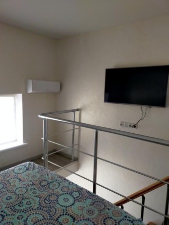 Бочарова, Атриум, двухуровневый смарт с большим балконом - фото 1