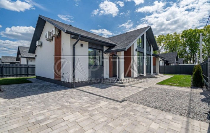 Оренда сучасного будинку у закритому котеджному містечку в Крюківщині - фото 1