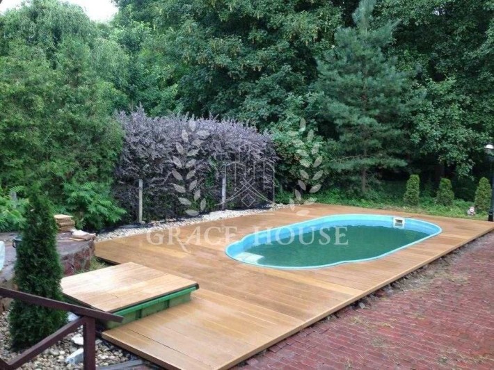 Аренда дома в Лесниках 237м2,Закрытая улица.10сот.Выход на канал и лес - фото 1