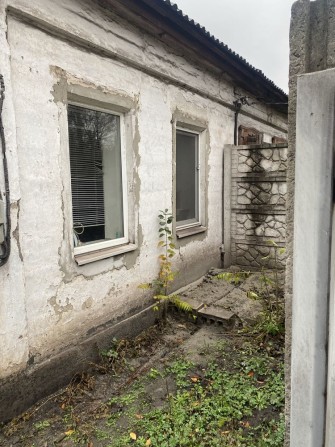 Продам 1/3 дома улица Короленковская Центр - фото 1