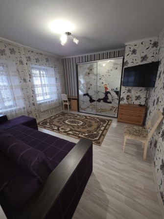 Полдома возле 1-й и 4-й школ - фото 1