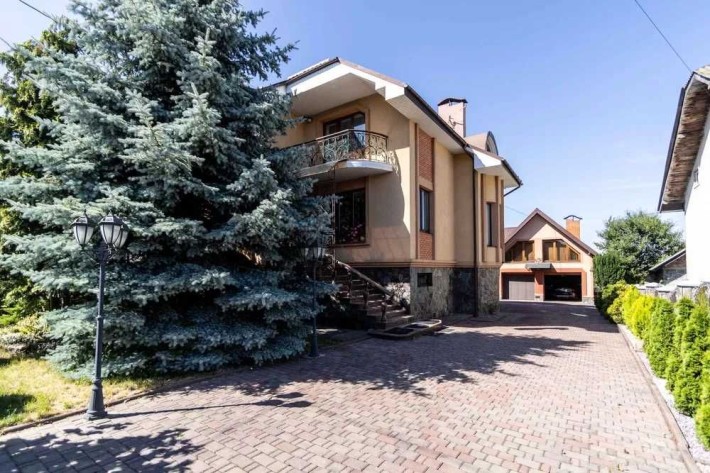 Продам сучасне домоволодіння в с. Угринів, вул. Самостійна - фото 1