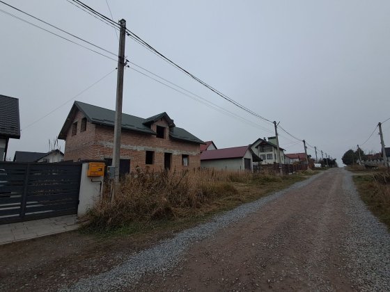 Продаж ділянки з незавершеним домом у Пустомитах Пустомыты