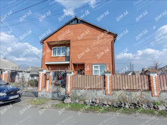 Будинок з господарськими спорудами у Решетилівці Решетилівка