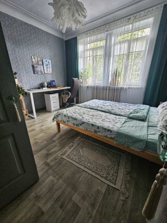 Продаю свою 2 кімнатну квартиру в центрі міста з власною ділянкою - фото 1