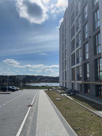 Класне планування 1к в будинку біля озера - фото 1