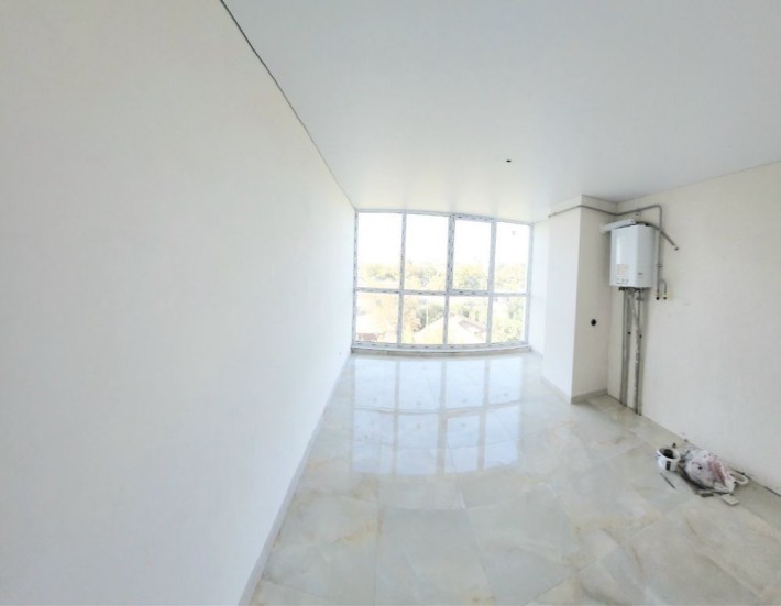 "Простора 2-кімнатна квартира в новобудові з ремонтом - фото 1