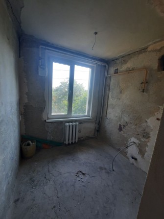 Квартира в центрі в стадії ремонту з будівельними матеріалами - фото 1