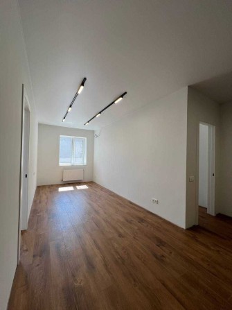 Продається 2‑кімнатна квартира у новобудові
вул. Збройних Сил України - фото 1