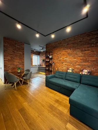 Сучасна квартира в новобудові в самому центрі міста - фото 1