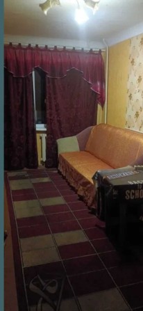 Кімната в трикімнатній квартирі молодому хлопцю - фото 1