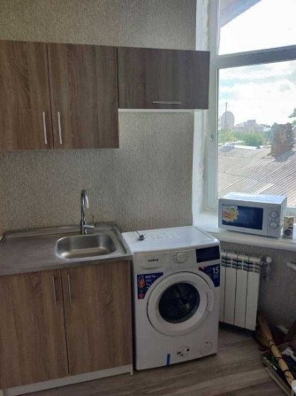 Гостинка в центре города - фото 1