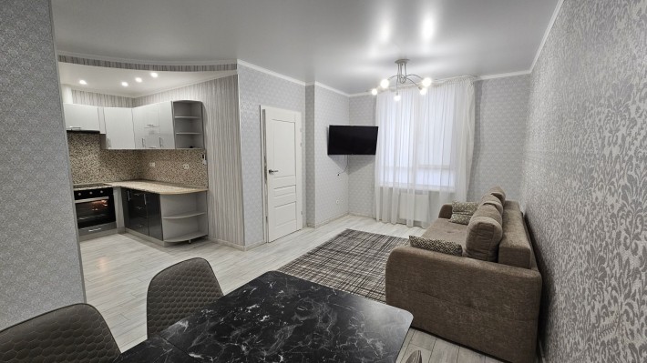 Сдам Евродвушку с евроремонтом в жк Сан Сити-дом с паркингом - фото 1