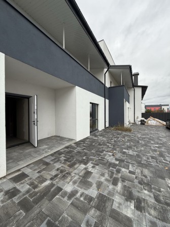 Двоповерховий таунхаус у Гостомелі з газом, під чистове оздоблення - фото 1