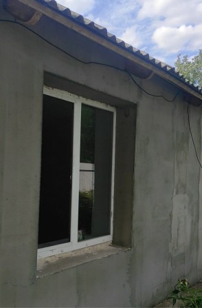 Продам будинок в Новомиколаївкі  зі усіма комунікаціїями - фото 1