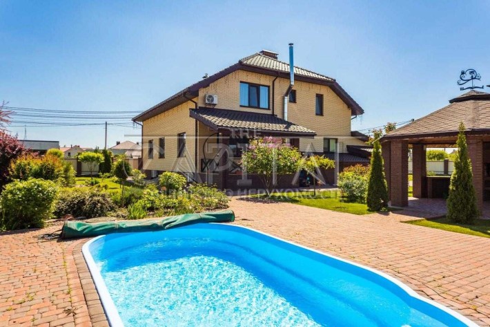 Продаж затишного будинку з  басейном в Крюківщині - фото 1