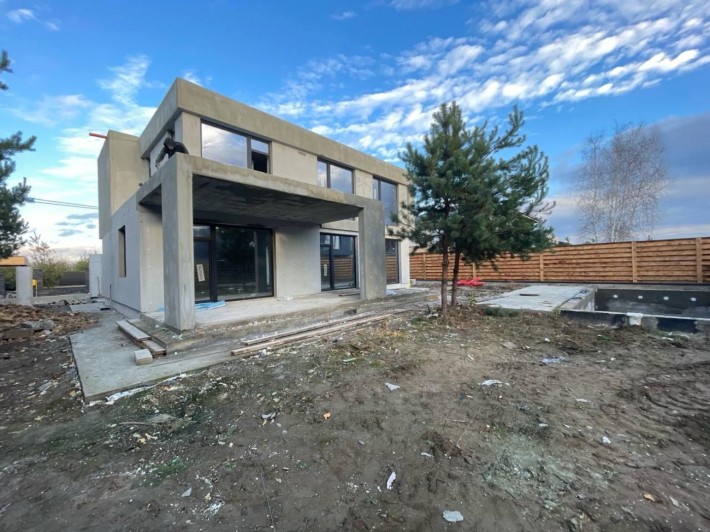 Сучасний комфортний будинок у стилі Hi-Tech - фото 1