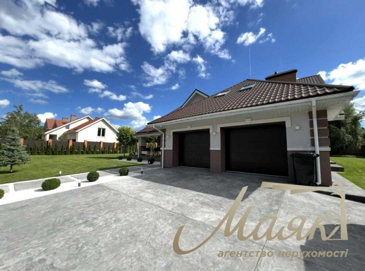 Продажа 2-х этажного дома с дизайнерским ремонтом 356м2 в Иванковичах - фото 1