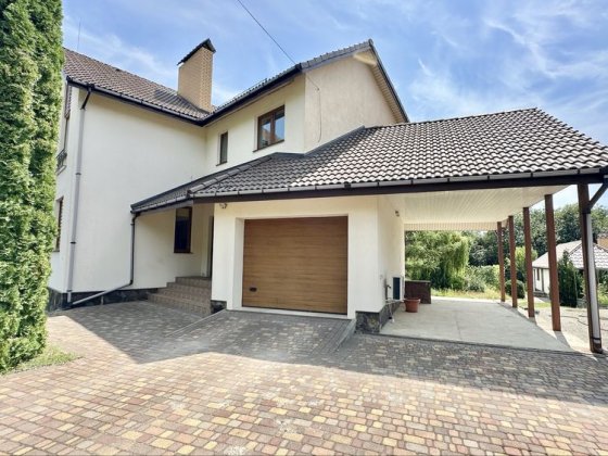 Якісний будинок з гаражем, ділянка 30 соток!З підвалом та ландшафтом Михайлівка-Рубежівка