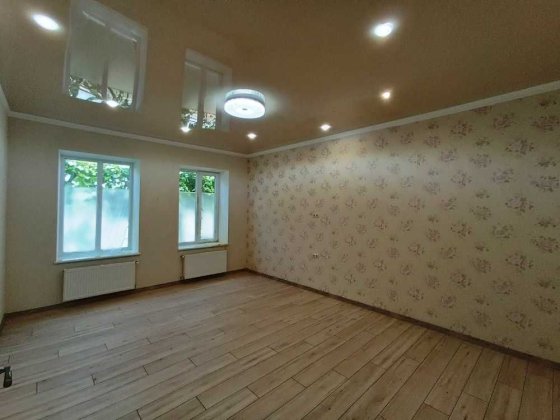 Два дома  с ремонтом в с.Троицкое, земли 32 сотки Беляевка