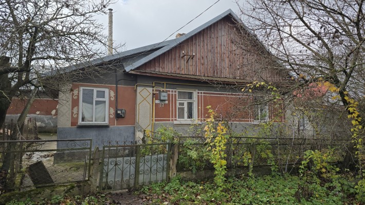 будинок у м. Волочиськ (вул. Руданського). Газ, зручності, 10 соток. - фото 1