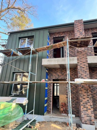 Сучасний таунхаус 105 м² з власною ділянкою у зручній частині міста - фото 1