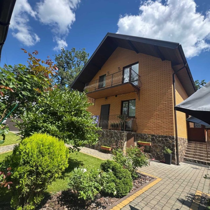 Будинок біля лісу в Бучі: ремонт, підвал, тераса та гараж - фото 1