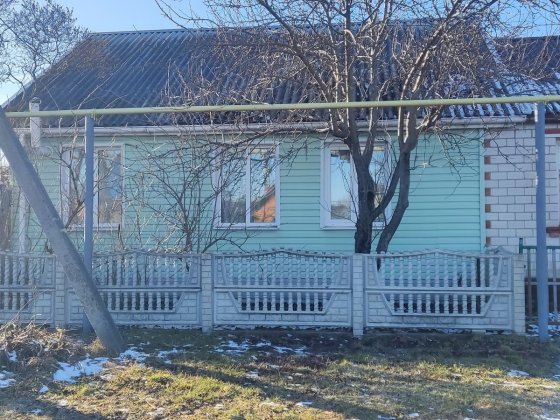 Продам 1/2 будинку в смт.Степанівка Суми