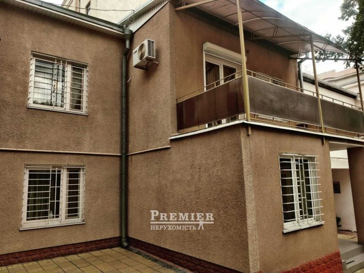 Приватність у серці міста: унікальний будинок на Пушкінській - фото 1