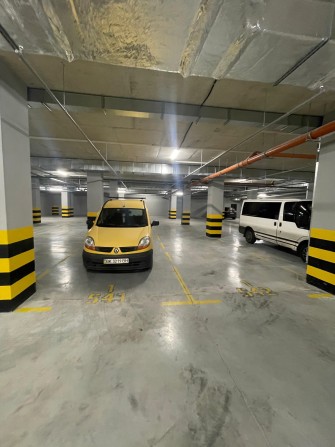 Продам Паркинг ЖК Атмосфера -1 этаж возле входа парко место Parking - фото 1