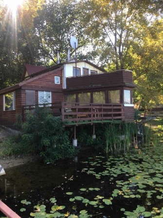 Оренда будинку для відпочинку на самому березі річки - фото 1