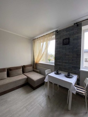 Сдам 1-комнатную квартиру-студию в новом доме в Лузановке - фото 1