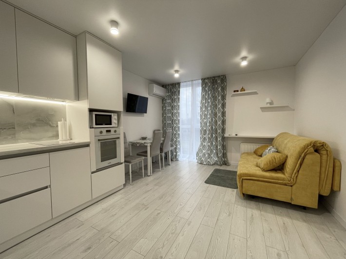 Оренда світлої квартири студії в ЖК Riel City, вул. Рудненська - фото 1