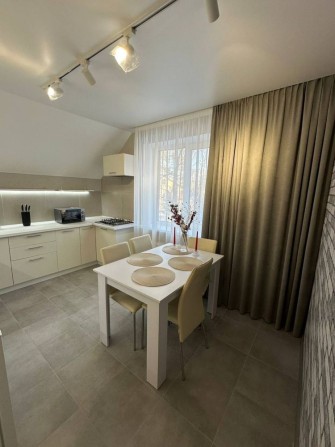 Затишний будинок 93 м² в Ірпені, новий ремонт, 2 спальні - фото 1