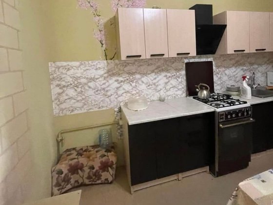 Частина будинку з місцем  для авто