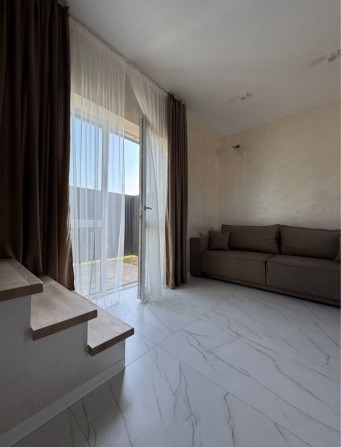 Оренда сучасного таунхауса 55 м² у с.  Білогородка - фото 1