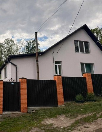 Продам новый дом с капитальным ремонтом в Мерефе - фото 1