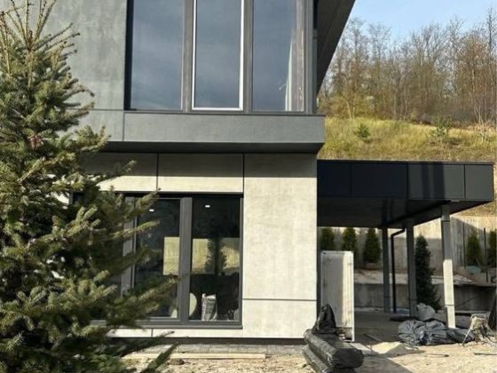 Видовий будинок на ділянці 16 соток Лесники