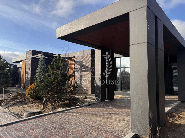 Продажа уникального дома в коттеджном городке премиум класса - фото 1