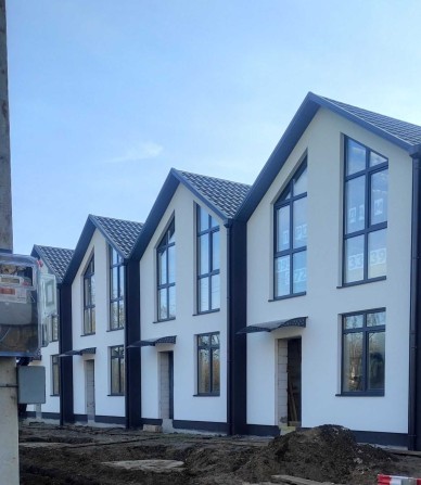 Продам двухэтажный таунхаус в Лесках. - фото 1