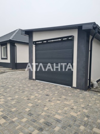 Новый дом с ремонтом и гаражом в с. Усатово на 7 сотках - фото 1