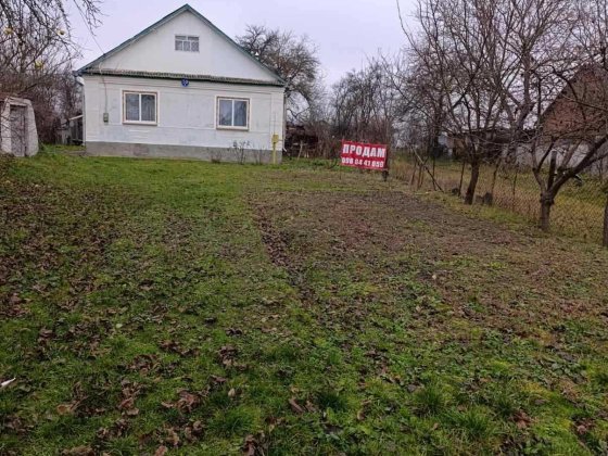 Продам цегляний  будинок Корец