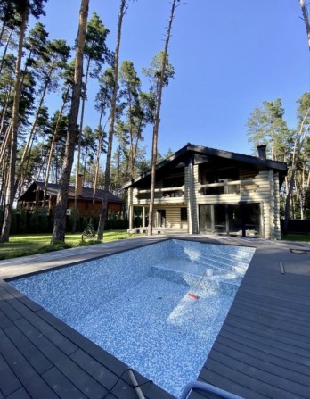 Продаж еко-будинку на 14 сотках серед лісу, басейн, баня, підвал - фото 1