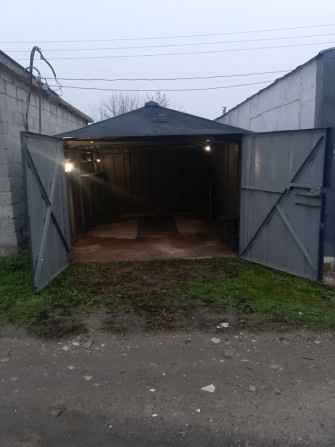 Сдам гараж в кооперативе Днепр,свет,яма,пол бетон,стол,полки - фото 1