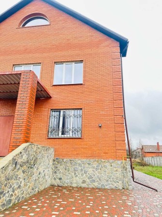 Продам Дом с полноценным жилым подвалом земля 15 сот Кулиничи Поле - 1 - фото 1