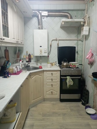 Продаю 4-х комнатную квартиру в центре - фото 1